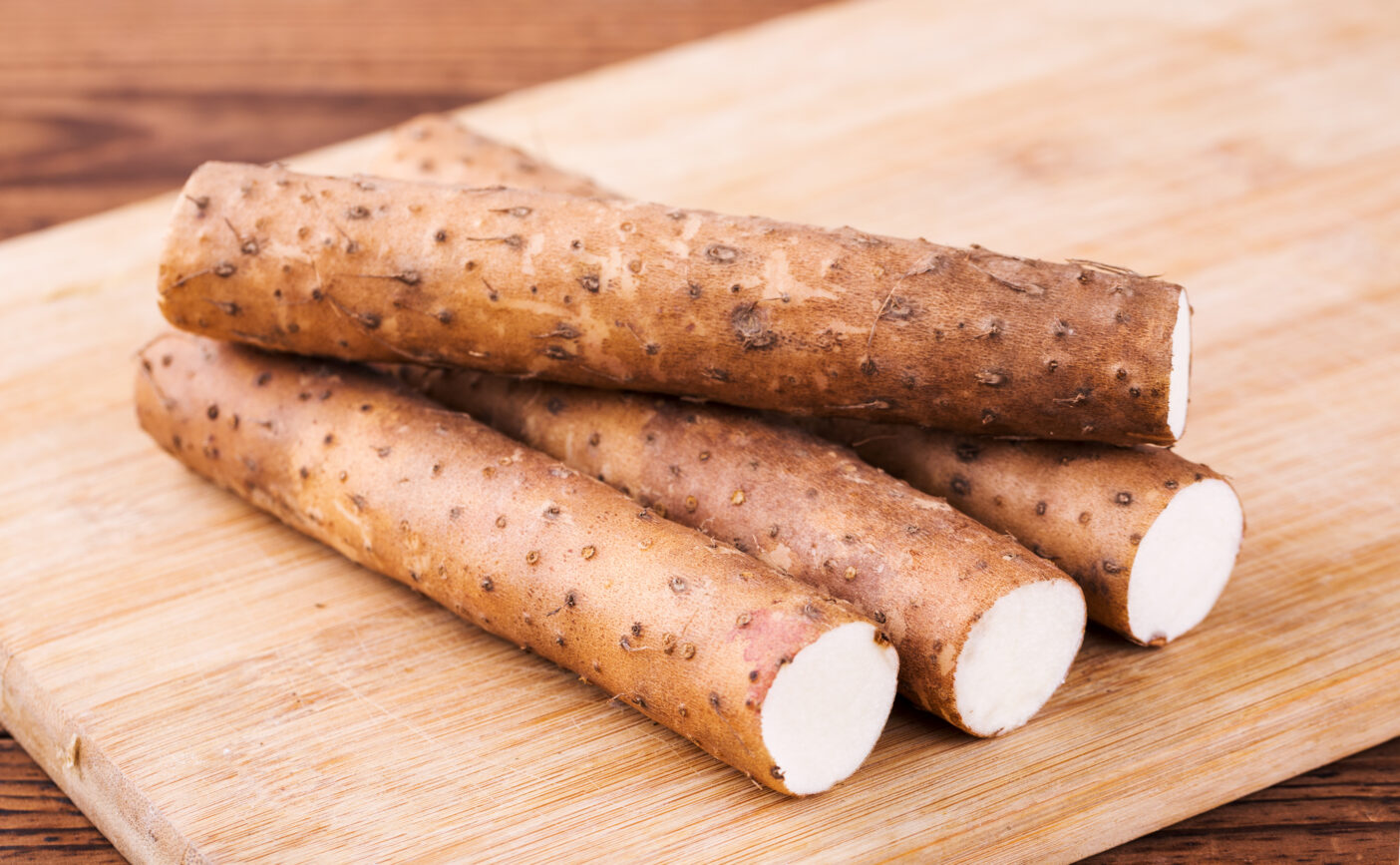 Yam on wooden table, closeup